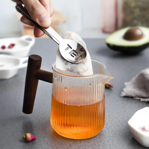 Vista 6 de Juego de 6 posavasos de cerámica blanca para bolsitas de té y exprimidor de bolsas de té de acero inoxidable (estilo 1)