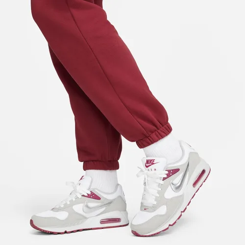 Vista 4 de Nike Pantalones deportivos de forro polar esencial para mujer Bv4091