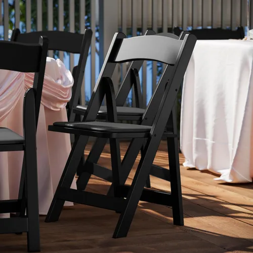 Vista 2 de HERCULES™ silla plegable de madera blanca, con asiento acolchado, Vidrio, Negro