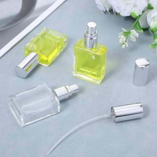 Vista 4 de Paquete de 24 botellas de atomizador de niebla fina de vidrio transparente, mini botella de perfume recargable de 0.5 onzas líquidas, botella