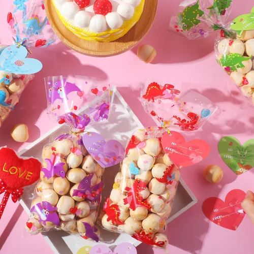 Vista 4 de Tellingyou 180 bolsas de celofán para el día de San Valentín, a granel, de plástico, con diseño de dinosaurio, dulces, con etiqueta de corazón