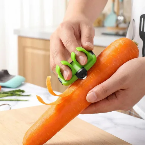 Vista 3 de Pelador manual de verduras, pelador de verduras, pelador de palma de mano, pelador de dedos de silicona, pelador de verduras de dedo, pelador