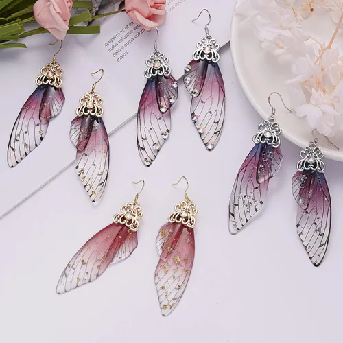 Vista 4 de BELLA-Bee - Aretes colgantes de alas de mariposa chapados en oro con cristal y diamantes de imitación, joyería para mujeres y niñas, joyería