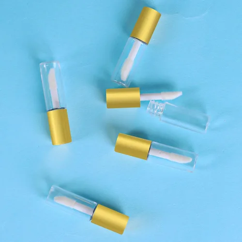 Vista 3 de Mydio Paquete de 50 recipientes vacíos de bálsamo labial con tapa dorada para lápiz labial (dorado)