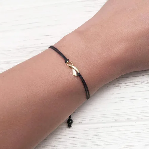 Vista 2 de Gold Ribbon Support Friendship Bracelet, September Childhood Cancer Awareness Month, Handmade Small 18K Gold Plated Ribbon Shaped Charm with Black