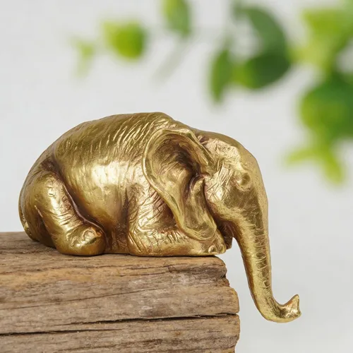 Vista 2 de Braxio Estatua de elefante para decoración del hogar, escultura abstracta de elefante dorado de resina para estantes, escritorio, mesa, oficina