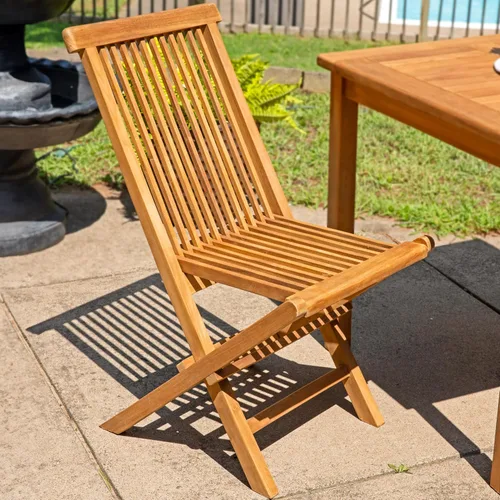 Vista 2 de Sunnydaze Hyannis Sillas de comedor plegables para exteriores de teca maciza, acabado de madera clara, 1 silla