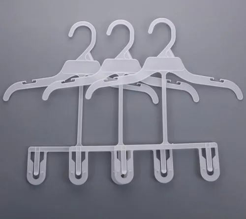 Vista 3 de WellieSTR Perchas de plástico antideslizantes para guardería, 50 piezas, blanco, 9.8 in (S)