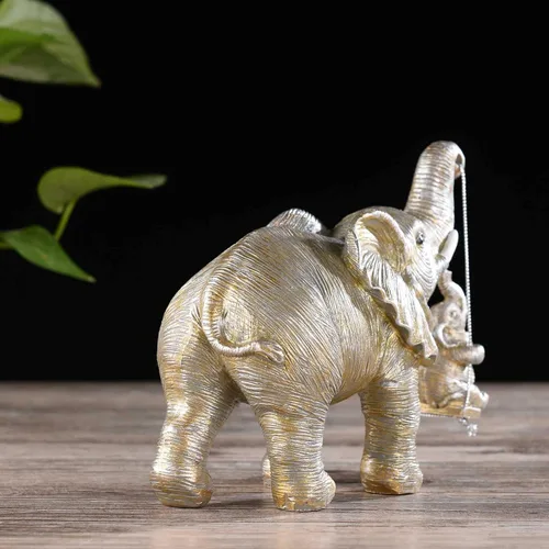 Vista 5 de BRASSTAR Estatua de elefantes de plata de resina bebé elefante sentado en columpio figura traer suerte felicidad riqueza decoración del hogar 7.1