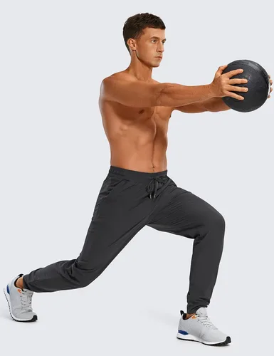 Vista 3 de CRZ YOGA Pantalones deportivos de golf ligeros para hombre, pantalones casuales de entrenamiento con bolsillos
