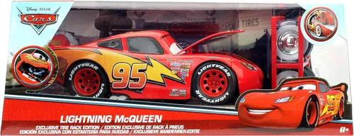 Vista 2 de Disney Pixar Cars 3 1:24 Lightning McQueen - Auto fundido a presión con estante para neumáticos (99751)