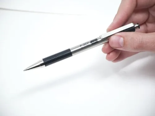 Vista 7 de Zebra Pen F-301 - Bolígrafo de acero inoxidable retráctil, punta fina 0.7mm, 6 negros y 6 azules - Paquete de 12
