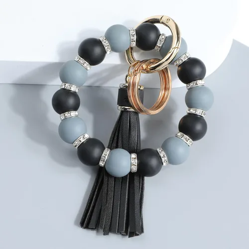 Vista 2 de Llavero pulsera elástica de silicona con cuentas de moda brazalete para llaves de coche para mujeres y hombres