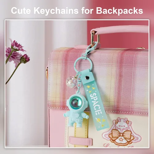 Vista 6 de YOU WIZV Llavero de astronauta, lindos llaveros Kawaii de anime geniales para mochilas, llaveros espaciales con luz de puesta de sol para mujeres