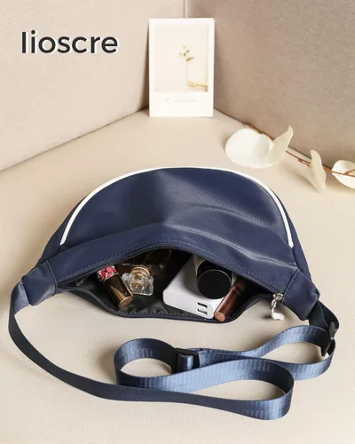 Vista 7 de Pequeño bolso cruzado para mujeres y hombres, mini bolso bandolera con correa ajustable y cremallera, bolsa ligera de media luna para viajes