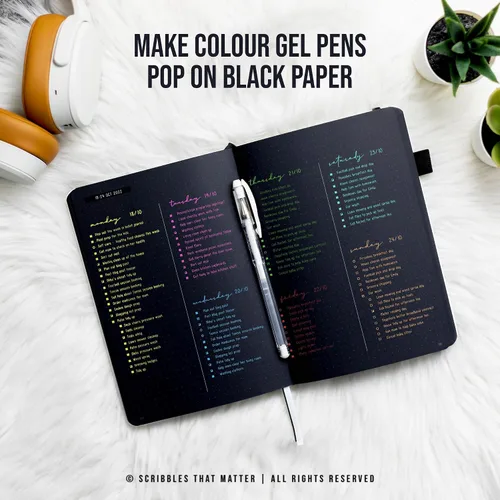 Vista 5 de Cuaderno de diario con viñetas de puntos de bala en papel negro A5 Starry Night de Scribbles That Matter Bolígrafo de gel blanco gratis Papel