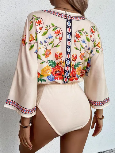 Vista 2 de OYOANGLE Body de manga 34 con cuello en V y estampado floral casual para mujer