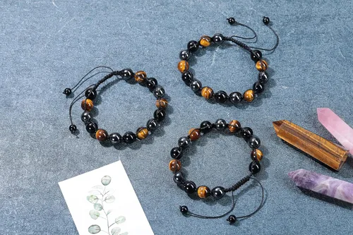 Vista 3 de Jovivi Pulsera de piedra de cristal de ojo de tigre de obsidiana negra de 0.315 in0.394 in para hombre, pulsera de piedra de lava con cuentas