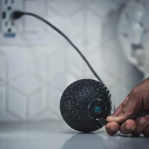Vista 2 de Compex Molecule - Pelota de masaje vibratoria compacta