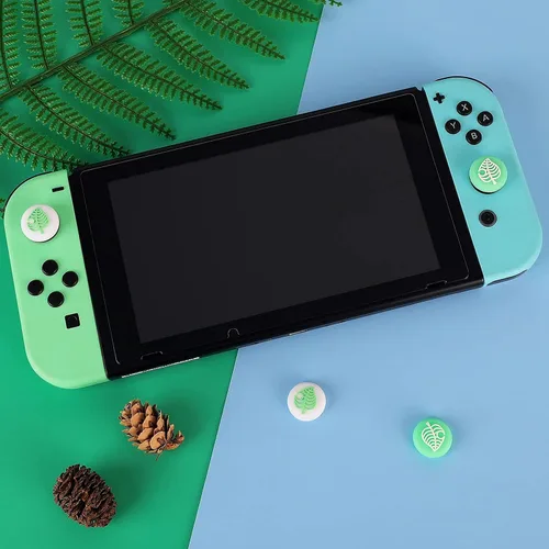 Vista 2 de Tscope Lindas tapas de agarre para el pulgar para Nintendo SwitchLiteOLED para Animal Crossing Kawaii Leaf Joystick Analog Soft Silicone Button