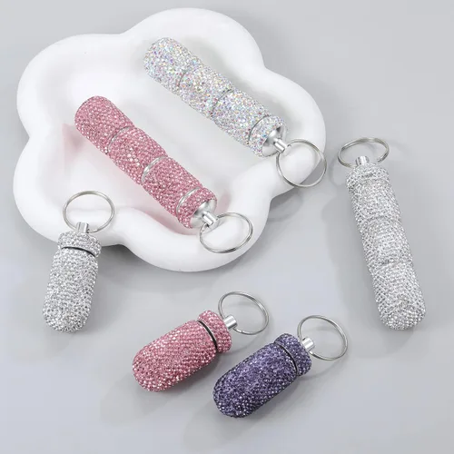 Vista 4 de Pastillero de viaje portátil con diamantes de imitación, impermeable, pequeño pastillero con llavero, bonita caja de almacenamiento de pastillas