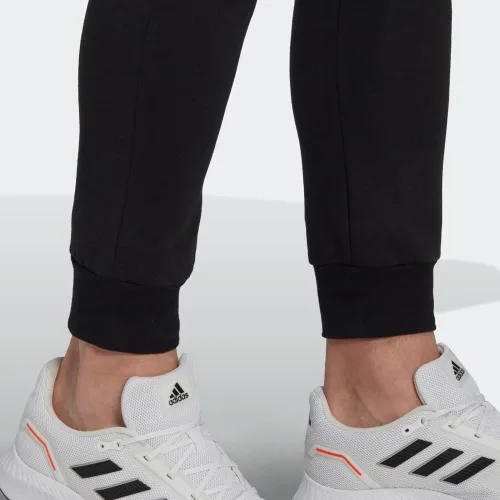 Vista 7 de adidas Pantalones cónicos regulares de forro polar Essentials para hombre