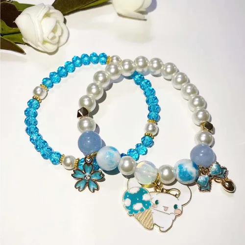 Vista 2 de Pulsera de cristal Kawaii con cuentas elásticas de dibujos animados, conjunto de pulseras a juego de pulseras de cuentas de cristal azul, rosa