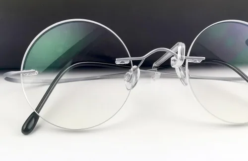 Vista 2 de Circleperson Anteojos de titanio sin montura Vintage Small Round 43-22-145 W Lente transparente para hombres mujeres