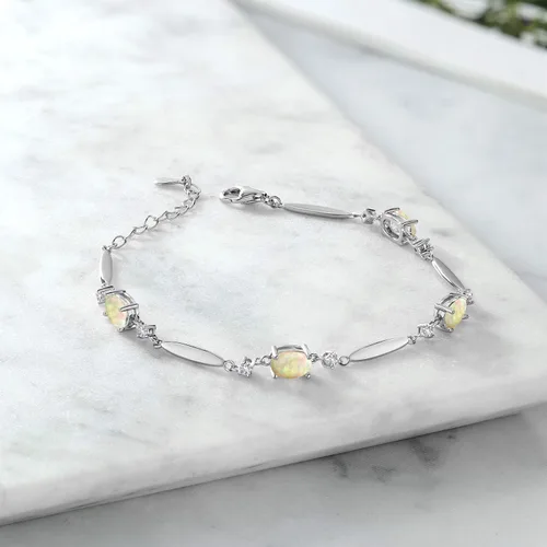 Vista 58 de Gem Stone King 925 Sterling Silver Gemstone Birthstone and White Created Sapphire Tennis Bracelet For Women Oval 7X5MM and 2MM 6 Inch + 1 Inch