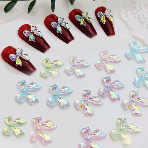 Vista 7 de Abalorios de uñas de arco Aurora coloridos 3D, 2 cajas de 24 piezas cada una, resina acrílica, forma de lazo, diamantes de imitación para arte