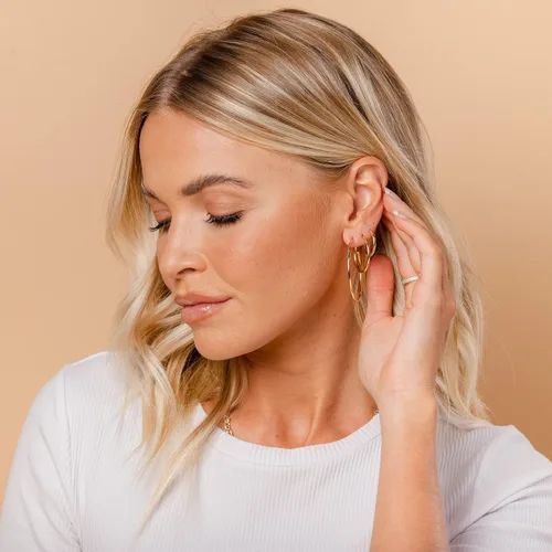 Vista 4 de PAVOI Aretes de aro chapados en oro de 14 quilates para mujer, aretes de aro de oro infinito de 0.079 pulgadas de grosor, aretes de bucle chapados