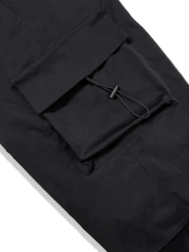 Vista 5 de OYOANGLE Pantalones cargo para hombre, cintura elástica, bolsillos con solapa, pantalones de harén holgados de hip hop