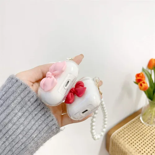Vista 5 de Funda transparente compatible con AirPods 1 y 2, hermoso diseño de lazo colorido con pulsera de perlas de lujo, ultrafina, funda protectora de RosaA