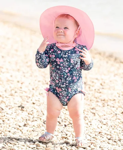 Vista 2 de RuffleButts - Gorro de sol para bebés y niñas pequeñas con protección solar UPF 50+ y ala ancha