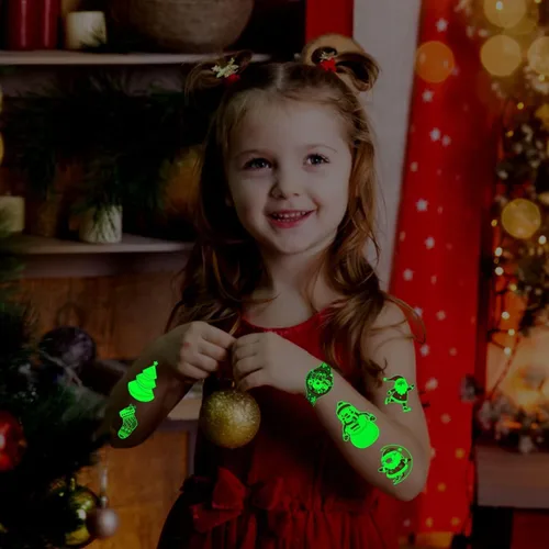 Vista 6 de Partywind Tatuajes temporales de Navidad que brillan en 160 estilos para rellenar calcetines infantiles, suministros de decoración de fiesta