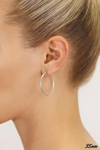 Vista 2 de Aretes redondos clásicos de oro blanco de 14K sin extremos