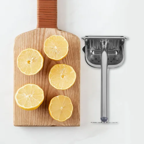 Vista 5 de Exprimidor manual de frutas de acero inoxidable para el hogar y camping, práctico exprimidor de cítricos y mangos, extractor no eléctrico