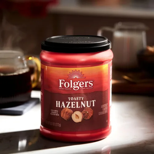Vista 19 de Folgers Café molido con sabor a caramelo mantequilla, recipiente de 9.6 onzas (paquete de 6)