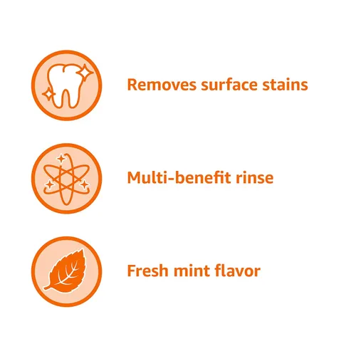 Vista 5 de Amazon Basics Enjuague bucal anticaries blanqueador, sabor menta fresca, blanquea los dientes, previene caries, 16 onzas líquidas, 1 paquete