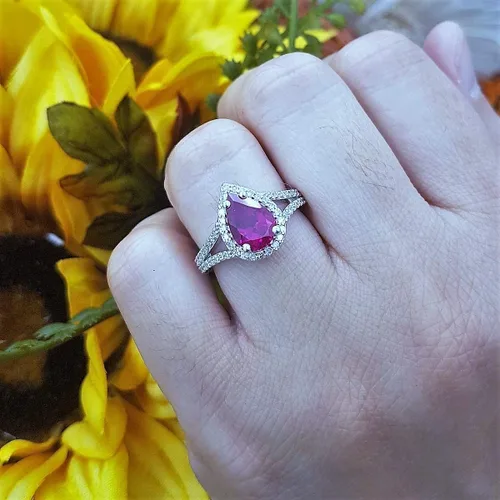 Vista 49 de Dazzlingrock Collection Anillo de compromiso con forma de lágrima y diamante blanco natural redondo de 0.45 quilates con halo de diamantes blancos