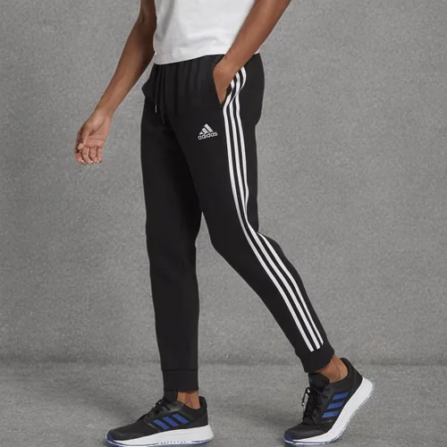 Vista 6 de adidas Pantalones Essentials de forro polar con 3 rayas para hombre, Negro