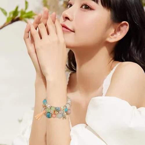 Vista 6 de Juego de pulseras apilables de cuentas para mujer y hombre juego de pulseras elásticas multicapa joyería multicolor aretes largos de perlas