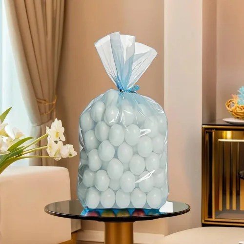 Vista 4 de Bolsas de plástico de celofán azul bebé para fiestas - 11.5" x 5" (30 unidades) Perfectas para regalos, dulces, golosinas