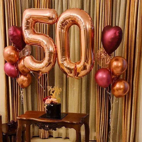 Vista 4 de Globos de 101,6 cm con número 50 en color oro rosa, globos gigantes de aluminio de 50, globos de helio con número digital en oro rosa, globos de oro