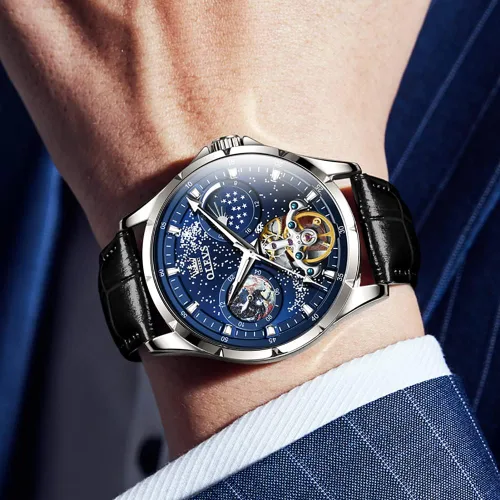 Vista 3 de OLEVS Reloj para hombre, esfera de cielo estrellado, Universo de Vía Láctea, cuerda automática, correa de cuero azul, vestido de moda, impermeable