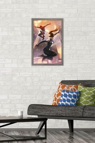 Vista 2 de Trends International Marvel Comics Spider-Man - Póster de pared #8 de Spider-Girl, 22.4 pulgadas de largo x 14.7 pulgadas, versión enmarcada