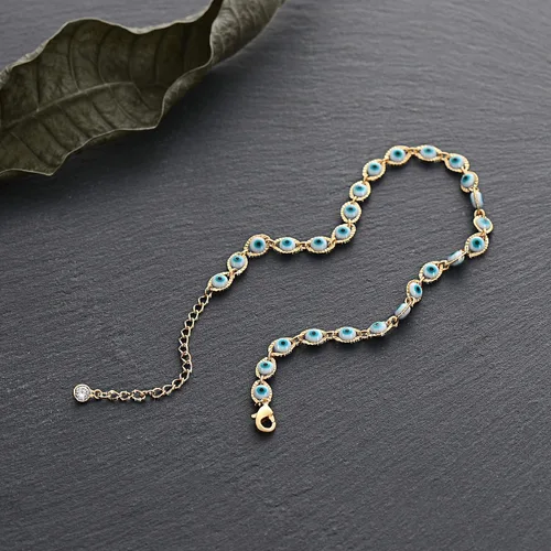 Vista 4 de LOYATA - Tobillera delicada bañada en oro de 14 quilates para mujeres, con pequeña cruz de circonia cúbica blanca y borlas bonita joyería