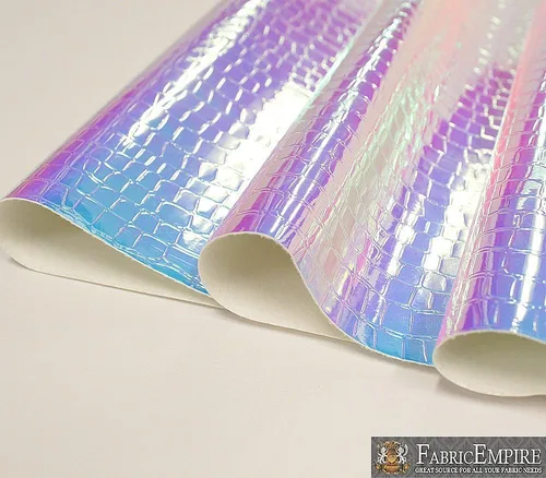 Vista 3 de Fabric Empire Tapicería de vinilo en relieve cocodrilo holográfico brillante tela azul claro 54 pulgadas de ancho vendido por The Yard