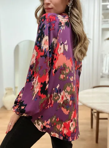 Vista 2 de FARYSAYS Blusas sueltas con cuello en V y estampado abstracto para mujer