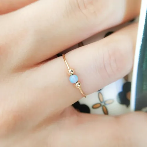 Vista 3 de Anillo de ansiedad anti estrés oro alivio del estrés Fidget preocupación anillo ajustable ópalo azul anillo giratorio chapado en oro